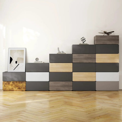 Stacked modular cabinets with mixed finishes arranged in a living room, showcasing storage options and decorative items on top