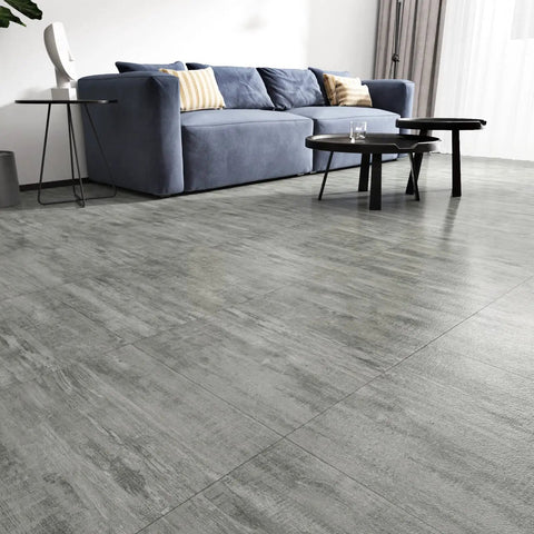 Grey Peel And Stick Floor Tiles 20 Pack, 12x12 Inch, Thick 1.5mm Wood Vinyl Flooring in living room setting with blue sofa.