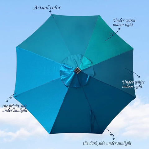 Top view of 9 Foot Solar LED Patio Umbrella with cerulean canopy showing color variation under different lighting conditions.