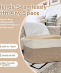 Oversized Woven Blanket Storage Basket, 21.6 Inch Long By 14.9 Inch Wide By 11.8 Inch High, 75L Capacity, White And Brown Cotton Rope Rectangle Toy Organizer for Living Room and Bedroom next to a bed.
