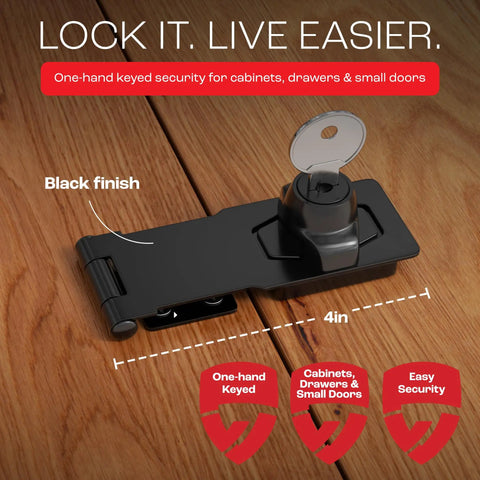 Close-up of a 4-inch black Keyed Twist Knob Hasp Latch Kit with keys, resting on a wooden surface.
