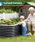 Oval Galvanized Raised Garden Bed Kit With Strengthened Crossbar For Tall Metal Planter Box To Grow Veggies In Outdoor Backyard 6 By 3 By 2 Feet Dark Gray Safe No Sharp Corners Heavy Duty And Easy To Set Up with child planting and elderly woman observing, curved corners visible.