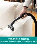 Wet Dry Canister Vacuum Cleaner 3.2 Gallon With 2.5 Peak HP Motor cleaning a sofa, showcasing versatile tool use.