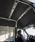Premium Van Conversion Insulation Roll installed on the roof of a cargo van, providing thermal and sound deadening.