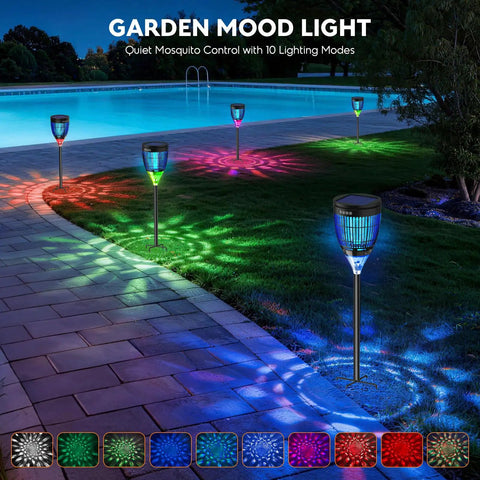 3 In 1 Bug Zapper For Outdoors Solar Powered With Realistic Flame Light And RGB Projector shown illuminating garden path by pool