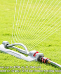 Heavy Duty Turbo Oscillating Sprinkler With 18 Brass Nozzles watering lawn, adjustable spray, aluminum base, quick connect bundle.