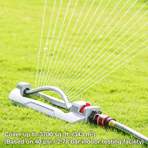 Heavy Duty Turbo Oscillating Sprinkler With 18 Brass Nozzles watering lawn, adjustable spray, aluminum base, quick connect bundle.