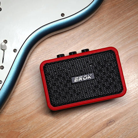 Mini 5W Electric Guitar Practice Amp With Clean And Overdrive Modes, Bluetooth Streaming, Headphone Jack, red amp on floor