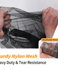 Massive Mesh Ball Bag For Coaches showcasing durable nylon mesh material with hands pulling to demonstrate tear resistance.