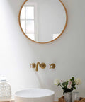 Antique Style Wall Mount Bathroom Faucet With Two Handles, Gold Brushed Finish, Solid Brass, vintage look next to round mirror
