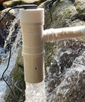 Go Anywhere 50W Portable Hydroelectric Generator With Spiral Turbine And USB Fast Charge installed in a stream