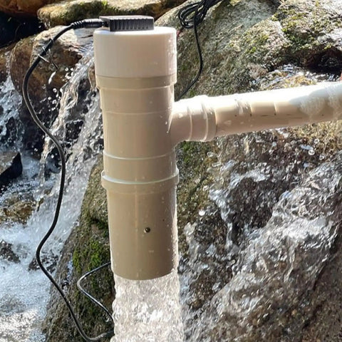 Go Anywhere 50W Portable Hydroelectric Generator With Spiral Turbine And USB Fast Charge installed in a stream