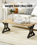 Living room with minimalist coffee table with 28 Inch High Metal Table Legs 2 Pack With Adjustable Floor Protectors Dope Durable Welded Cast Iron For Nightstands Coffee Tables Desks And DIY Projects Black, featuring wooden top and metal legs.