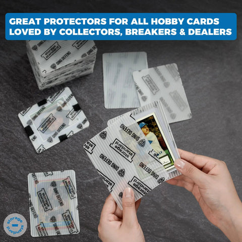 Person holding Shipping Protectors For Trading Cards Pro Grade Ultra Strong Plastic Inserts 110 Pack, displaying card insertion