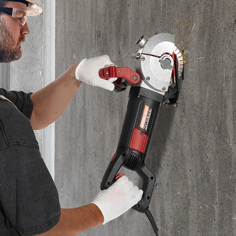 Man using Powerful 4800W Wall Chaser With Laser Guide 6500 RPM For Precise Concrete Grooving on concrete wall