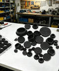 Awesome 125pc Silicone Rubber Hole Plugs Kit With 8 Sizes For Furniture And Auto Wiring. Durable Snap-Fit Round Stopper Grommets In Black. Heavy Duty Assortment Set Perfect For Sealing Holes. black silicone rubber hole plugs on workbench, assorted sizes