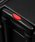 Close-up of the retractable pull handle button on the Hella Rugged Roto Molded Drum Hardware Case.