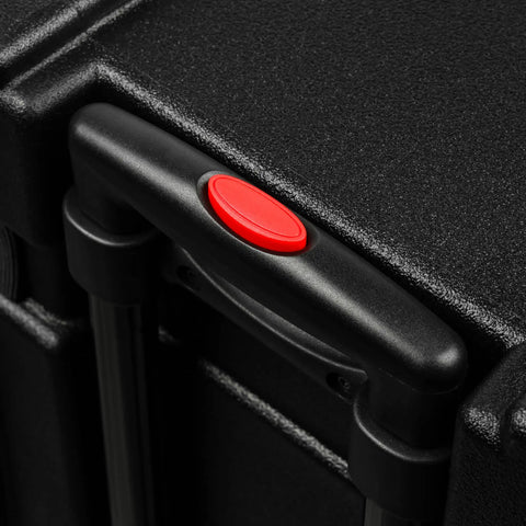 Close-up of the retractable pull handle button on the Hella Rugged Roto Molded Drum Hardware Case.