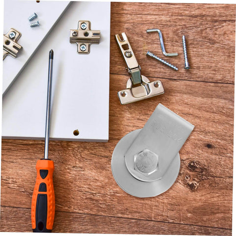 Stainless steel industrial pulley wheel for cable guide roller with screwdriver, hinges, and screws on wooden surface