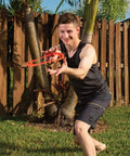 Man throws 10 Inch Sprint Ring Flying Disc for Maximum Distance, Lightweight Outdoor Ring Thrower in backyard