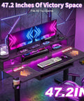 Level Up Your Gaming Space With This Electric Standing Desk That Offers Smooth Height Adjustment Customizable Rgb Lighting And Fast Usb Charging For Cool Setups, featuring 47.2 inch wide surface in sleek design.