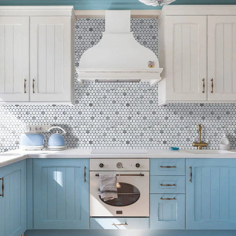 Modern kitchen with Penny Round Tile Peel And Stick Backsplash Kit With White Marble Look And Silver Metal Accent Self Adhesive Mosaic Tiles behind oven and cabinets.