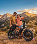 Two people enjoying nature with a Dual Battery Adult Electric Bike With 956 Wh Juice And A Mean 1800W Motor Logging Ninety Miles.