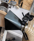 Heavy Duty Universal Woodturning Dust Hood featuring fully adjustable bracket, mounted on a lathe, with 100mm hose connector.