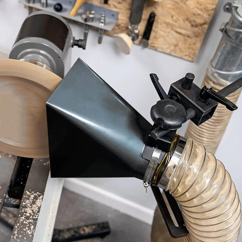 Heavy Duty Universal Woodturning Dust Hood featuring fully adjustable bracket, mounted on a lathe, with 100mm hose connector.