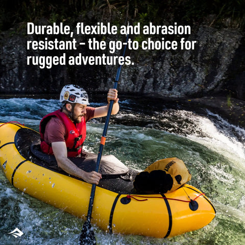 Kayaker with Big River Dry Bag 35 Liter Heavy Duty Waterproof Gear Storage on a yellow kayak in whitewater rapids.