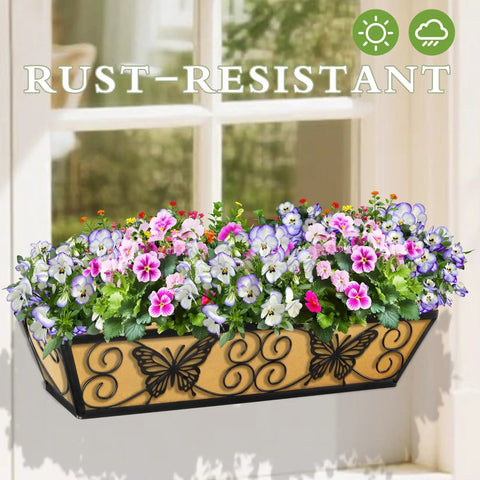 2 Pack 24 Inch Window Box Planters With Adjustable Brackets For Porch Fence Patio Balcony Hanging Flower Baskets Black Metal Outdoor Garden Decor With Woven Fabric And Elegant Butterfly Design filled with colorful flowers against window.