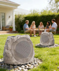 Rock Style Outdoor Bluetooth Speakers With Lights For Patio And Pool, Waterproof, Solar Powered, stone look speakers in garden setting.