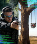 Shooter aiming at AR500 Steel Gong Targets Set 1/2 Inch Thick With Bear Head Laser Cut Silhouette hanging from tree with chains