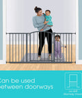 No-Fuss Extra Wide Decor Safety Gate For Babies And Pets, 27 Inch Tall, Easy Install in doorway, woman with children visible