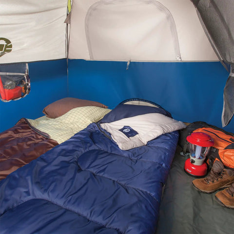 Blue Brazos 20 To 30 Degree Fahrenheit Adult Cool Weather Sleeping Bag With No Snag Zipper And Stuff Sack in a camping tent.