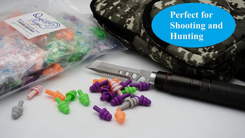 Reusable Silicone Ear Plugs Bulk Pack For Swimming Sleeping Concerts And Music With Up To 25dB Noise Reduction displayed with gear