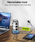 12 Outlet Surge Protector Tower With 6 USB Ports And 2 USB-C, 6.5 Foot Extension Cord For Home Office Setup on desk with devices