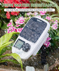 Solar Powered Drip Irrigation System With Automatic Timer For Pots And Indoor Plants, Emitter Stake Kit With USB Recharge Port exemplifying high water resistance amid rain.