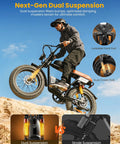 Rider jumps dune on Beast 1500W Fat Tire Electric Bike With 48V 20Ah Battery, showcasing dual suspension features.