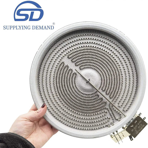 Hand holding Electric Range Dual Radiant Surface Element Replacement For Specific Model Fit Not Universal 240V 2500W And 1200W 9 And Three Quarters Inch Element With Updated Terminals, Compatible With 316555800 And 316418400, Easy DIY Kitchen Fix.