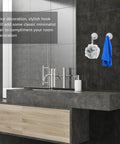 No Drill Needed Heavy Duty Stainless Steel Wall Hooks 6 Pack Adhesive Coat Hanger Set For Bathroom And Hallway Hold Up Great Under Weight With Zero Mess Or Drilling Required hanging towels and bath accessories in a modern bathroom.