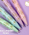 Kawaii Sanrio Pen Set With Four Color Ballpoint Pens Featuring My Melody And Kuromi Glitter Gold Foil Accents on purple background