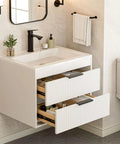 No Fuss 24 Inch Wall Mount Bathroom Vanity With Durable Resin Sink And Deep Twin Drawers, Smooth White MDF Floating Cabinet Featuring Matte Black Handles.