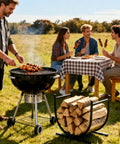 Outdoor barbecue scene with 17 Inch Heavy Duty Firewood Rack Holder, Metal Log Storage Stand with wood, near dining table