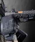 Person wearing 0.5mm AX-Suede Tactical Gloves With Tight Fit And Precision Feel For High Dexterity In Airsoft, Paintball, DIY And Work, Grippy Do-It-All Comfort With Secure All-Day Wear - Men's Large Black, holding a firearm.