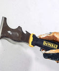 9-In-1 Painter's Tool With Straight And Curved Scrapers, gouger, hammer, held by gloved hand against wall