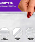 Close-up of Heavy Duty Aluminum Foil Sheets For Deli Use 100 Count Pop Up 9 By 10 Inch Wrapping Sheets showing thickness and embossed design