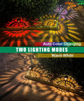 Seven Pack Solar Pathway Lights With RGB Color Changing And A Lit Warm White Glow on garden path at night