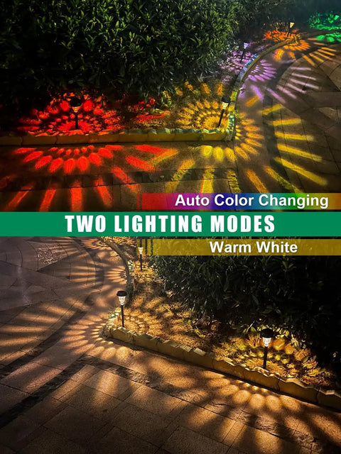 Seven Pack Solar Pathway Lights With RGB Color Changing And A Lit Warm White Glow on garden path at night