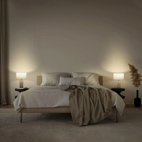 Bedroom scene with two Arden LED Table Lamp With USB Port on nightstands, creating ambient vibe with marble finish and stylish lampshade.